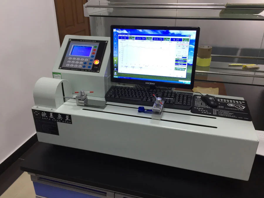 Close view of tape testing equipment and data display
